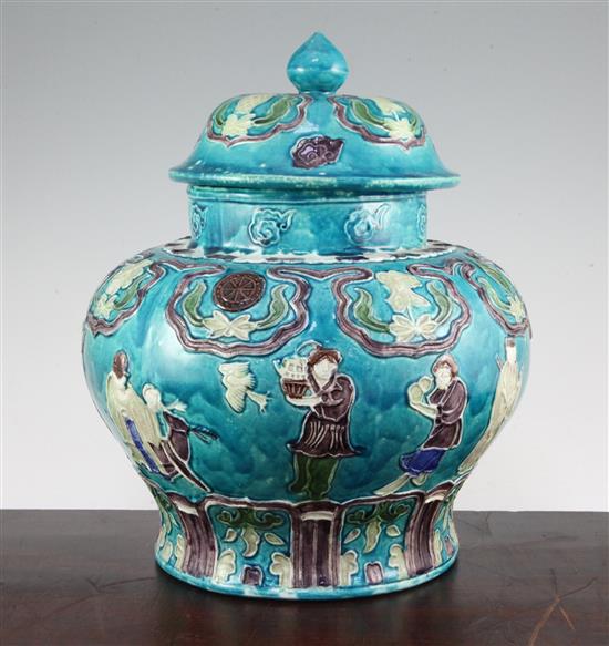 A Chinese Fahua decorated baluster jar and cover, 18th / 19th century, 32cm